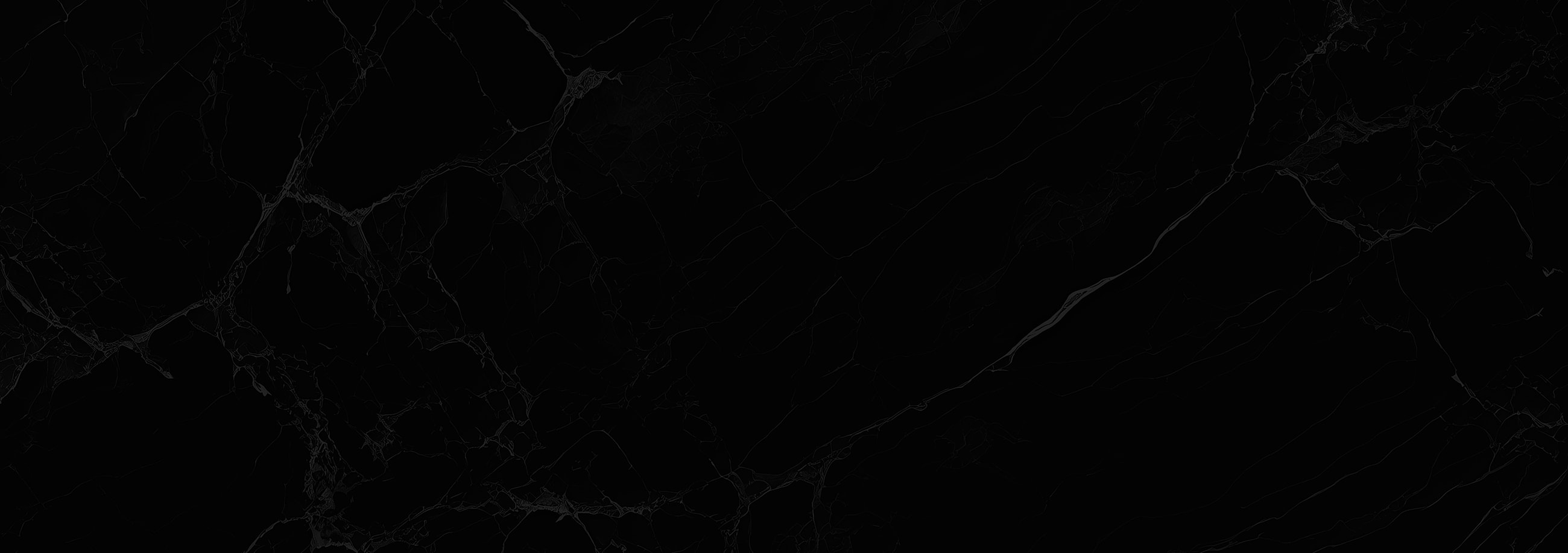 Black marble background with white veining.
