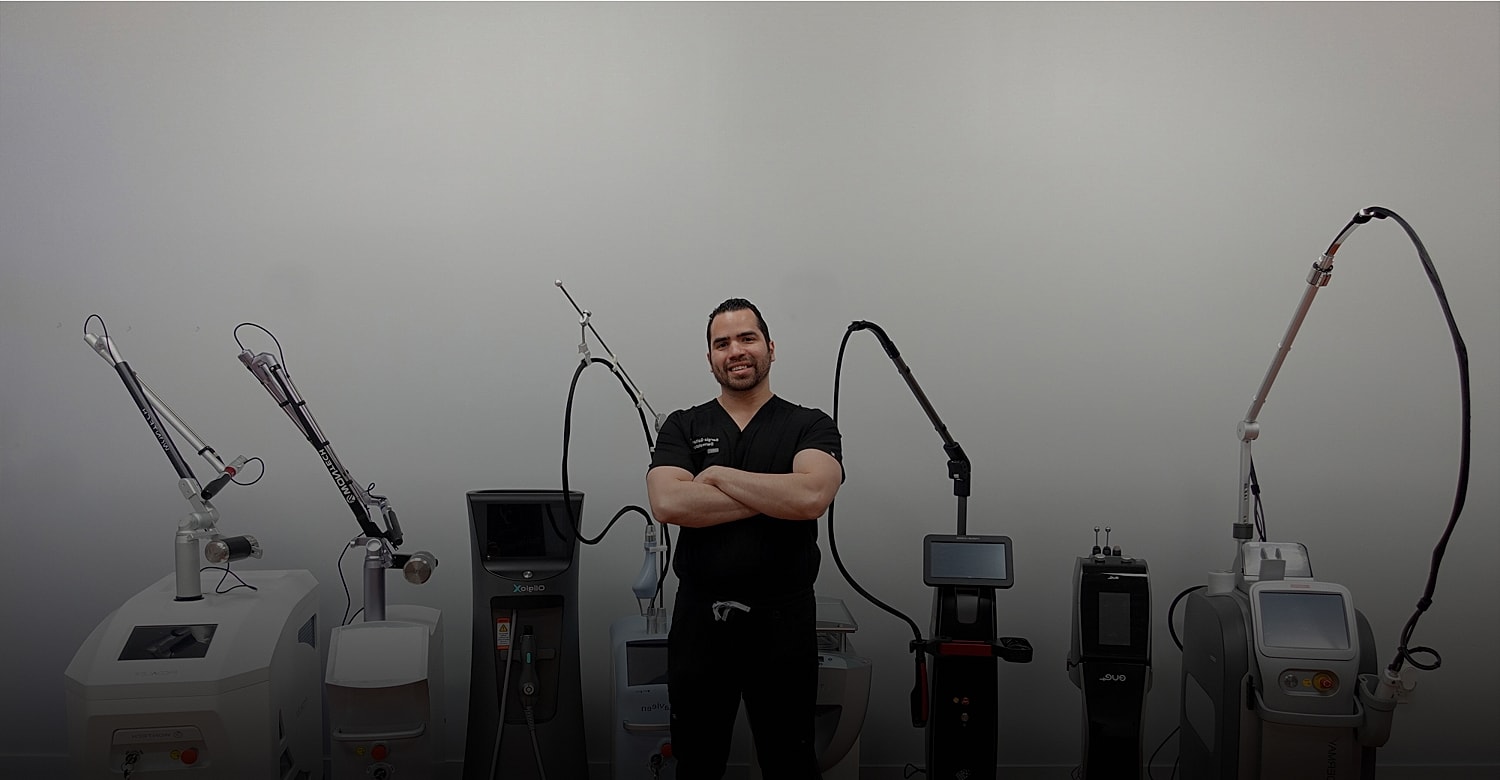 Medical professional with advanced skincare equipment.